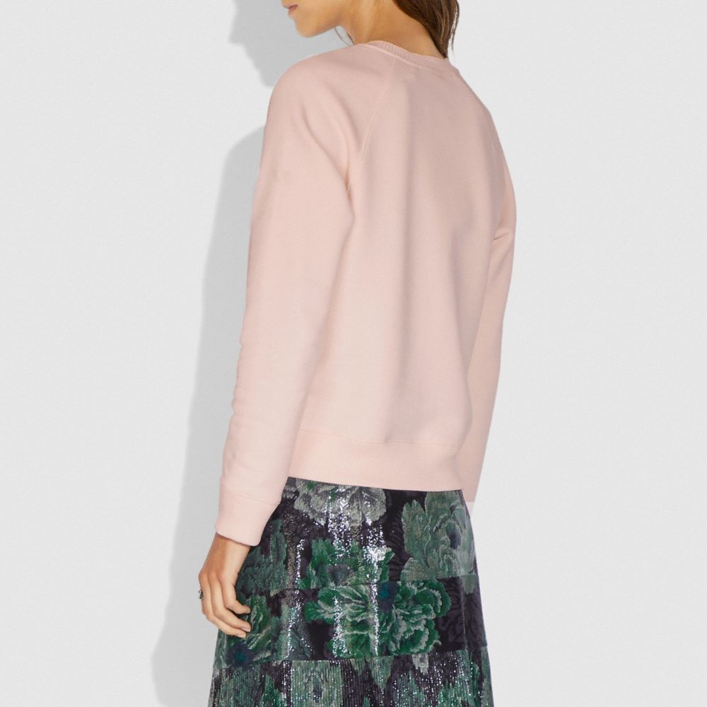 coach pink shirt