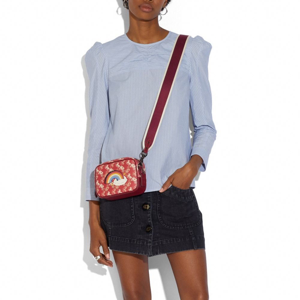 coach red camera bag