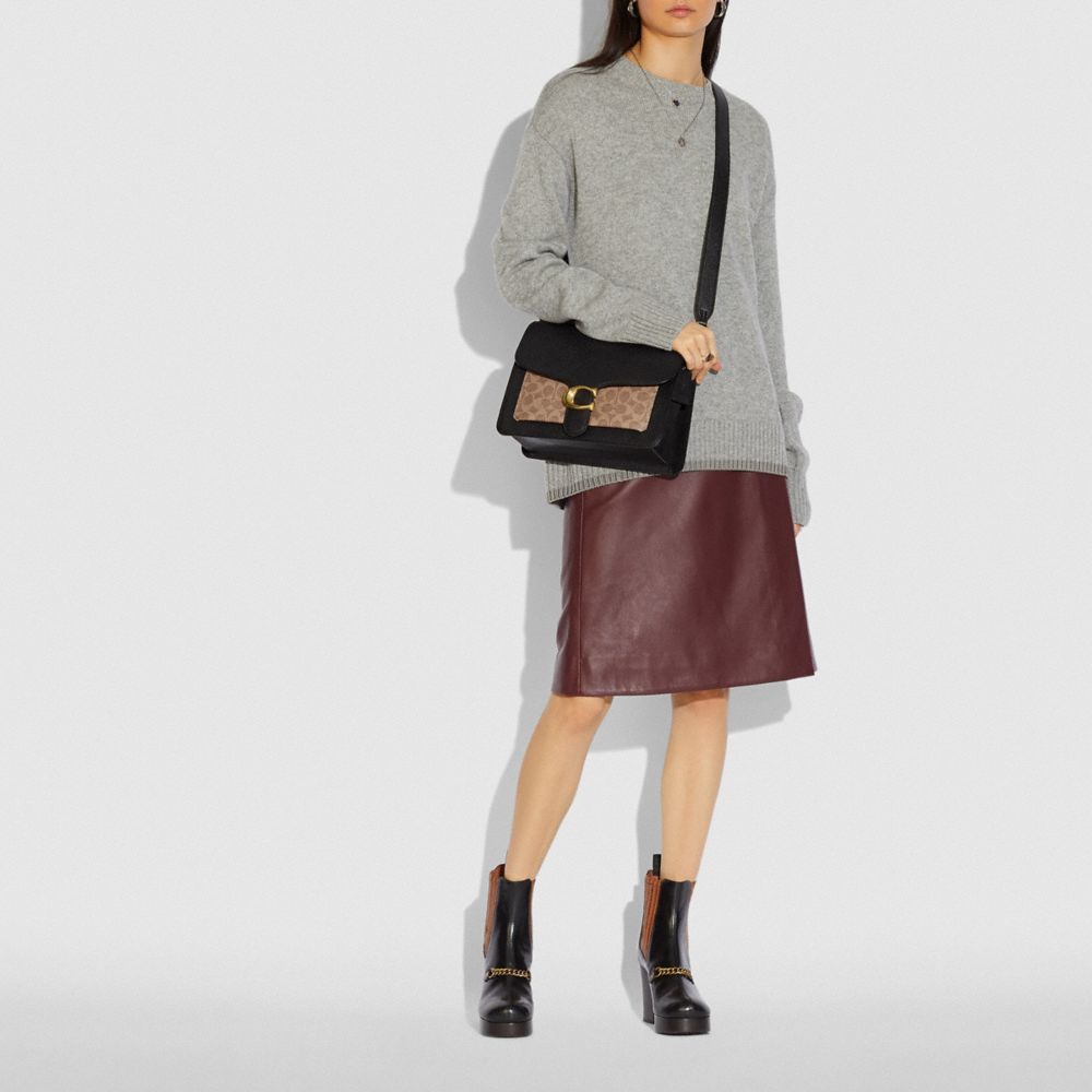 tan coach shoulder bag