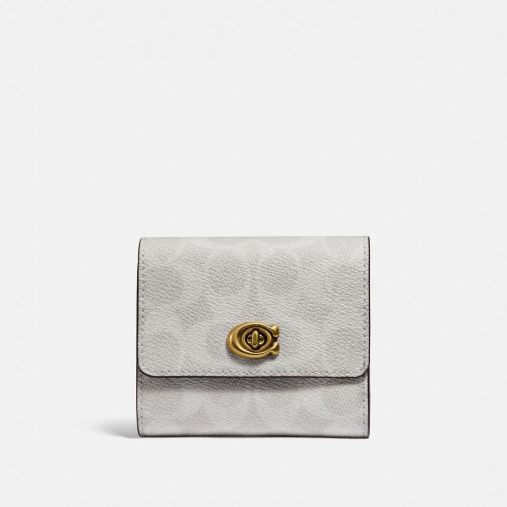 SIGNATURE TURNLOCK SMALL WALLET IN BLOCKED SIGNATURE CANVAS