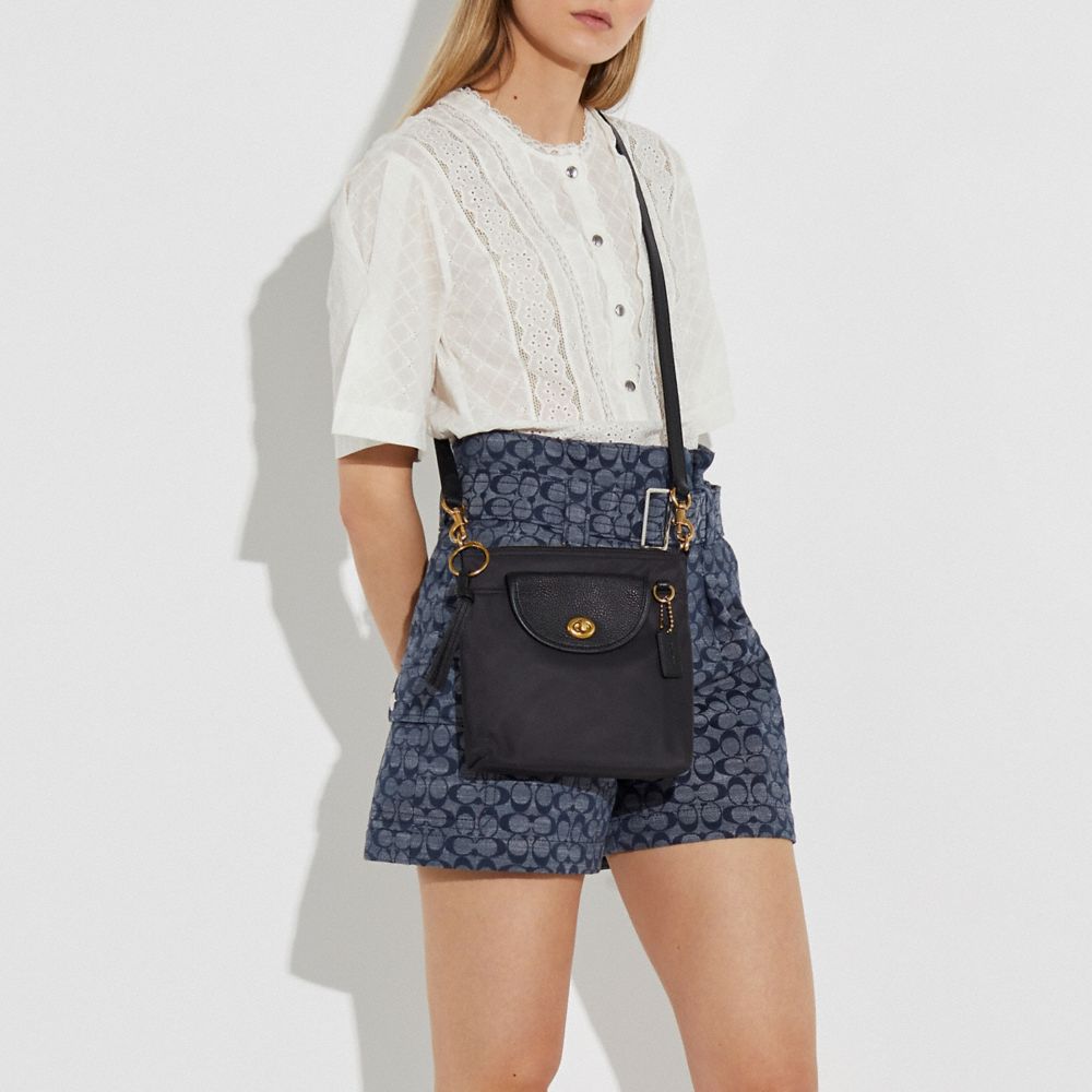 coach nylon vintage rose print interior cargo crossbody