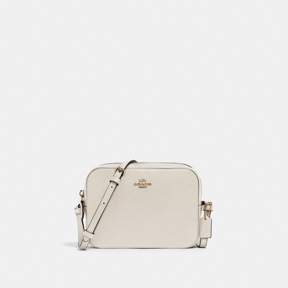 coach sling bag white