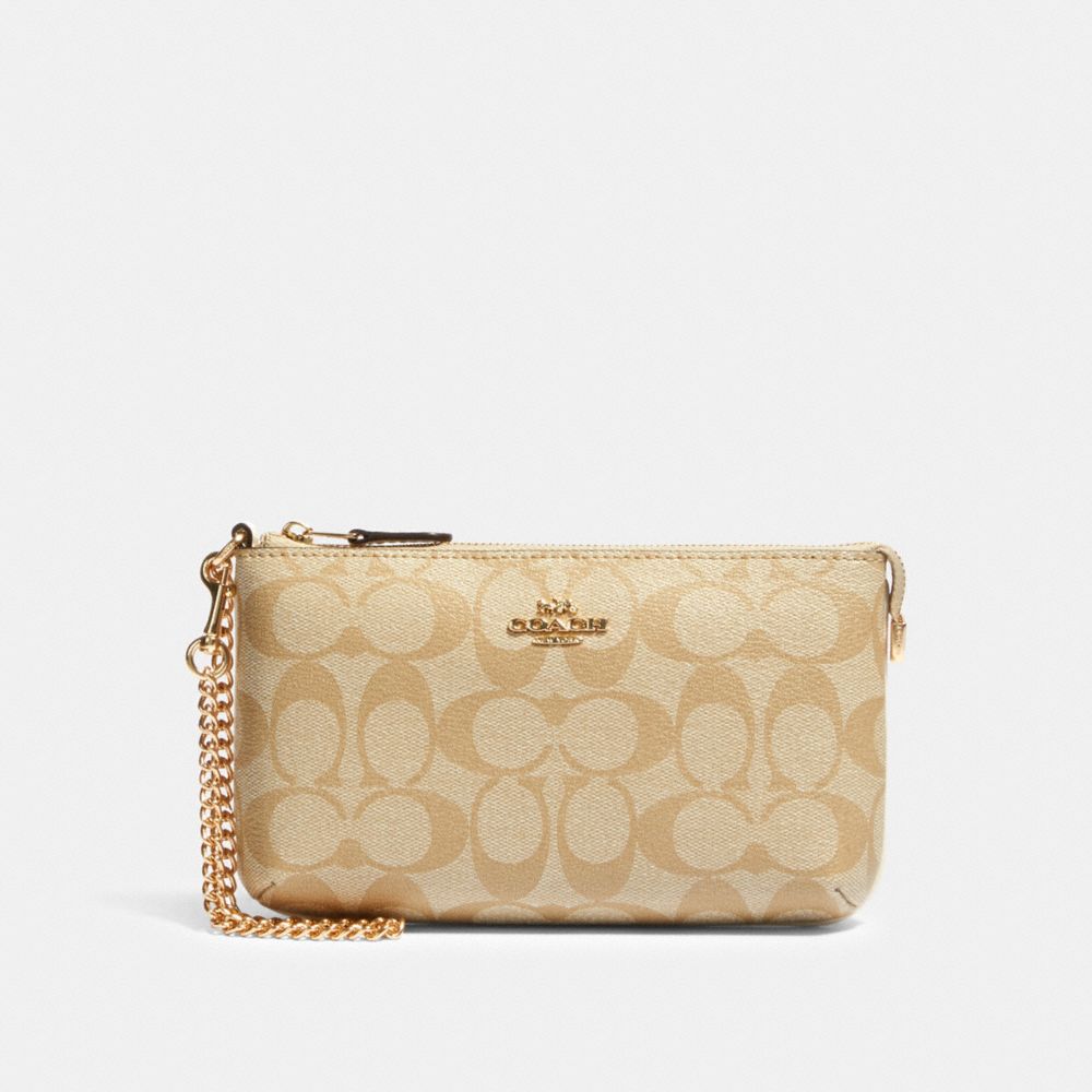 coach beige wristlet