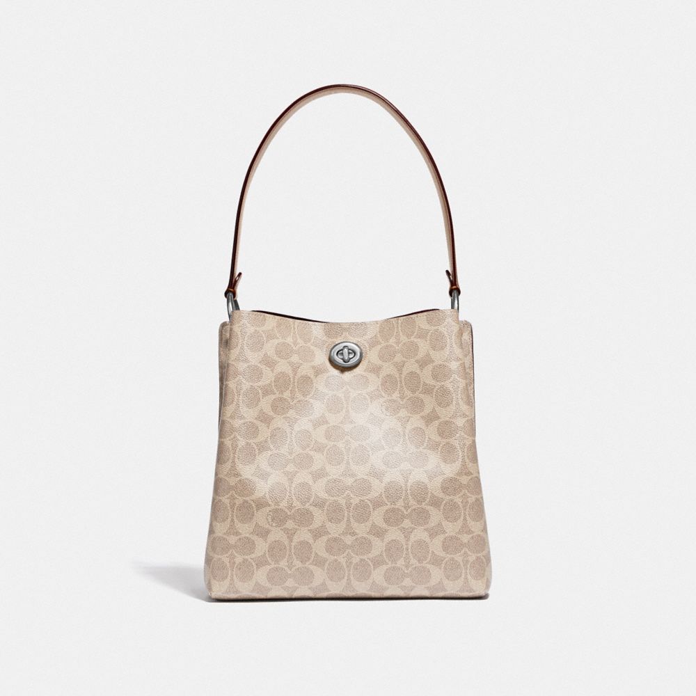 Coach Charlie Bucket Bag In Signature Canvas - Women's In Light
