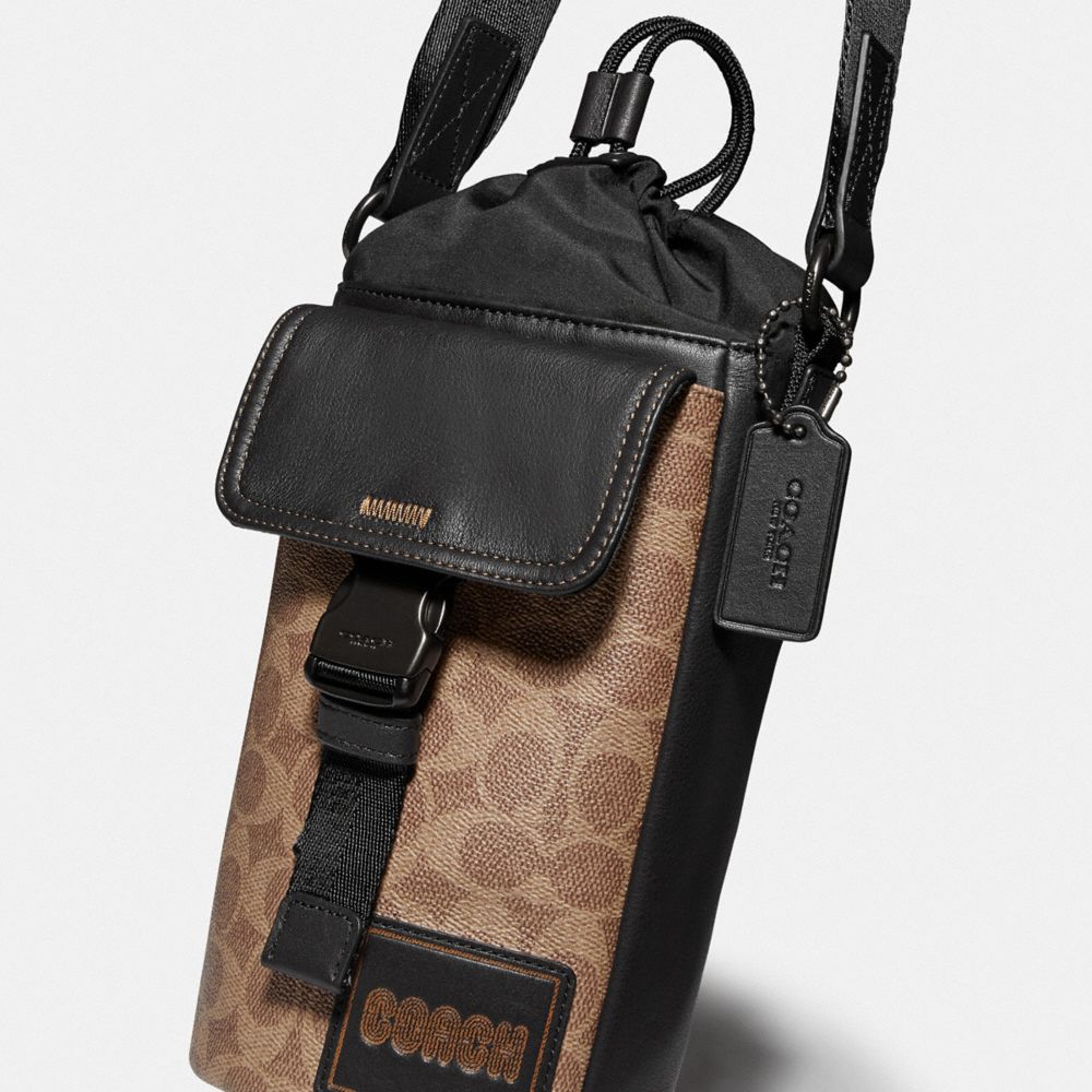 COACH Pacer Drawstring Crossbody In Signature Canvas With Patch