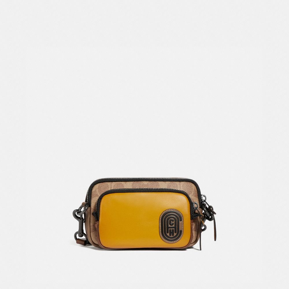 pacer convertible double pouch in colorblock signature canvas with coach patch