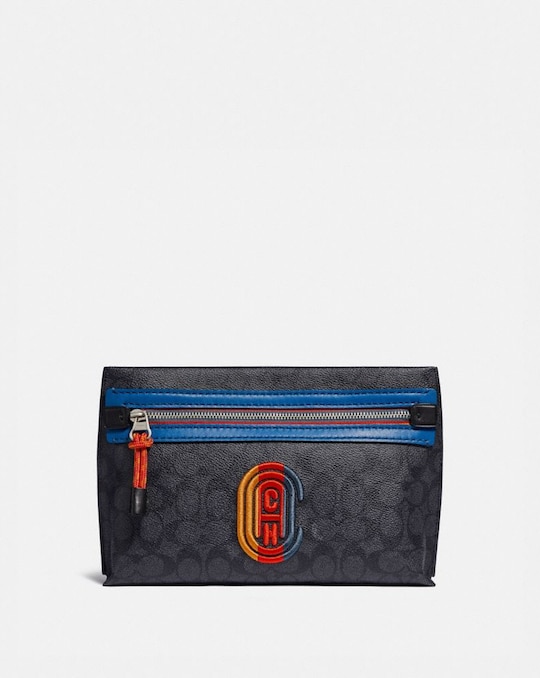 CONVERTIBLE ACADEMY POUCH IN SIGNATURE CANVAS WITH COACH PATCH
