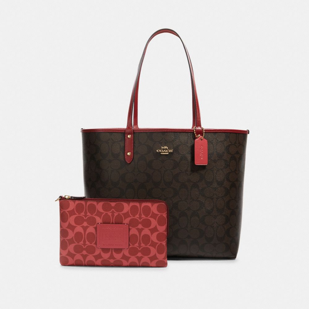coach signature reversible city tote