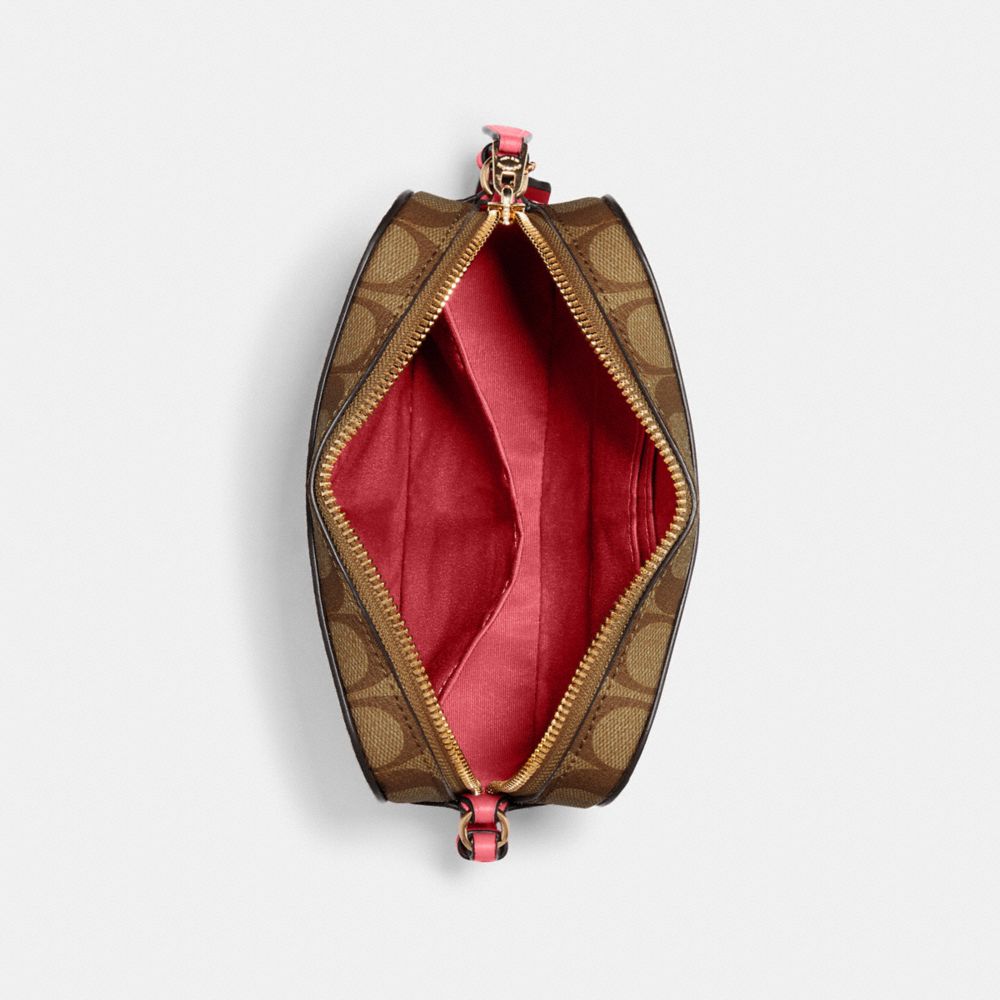 MINI CAMERA BAG IN SIGNATURE CANVAS - Alternate View 1