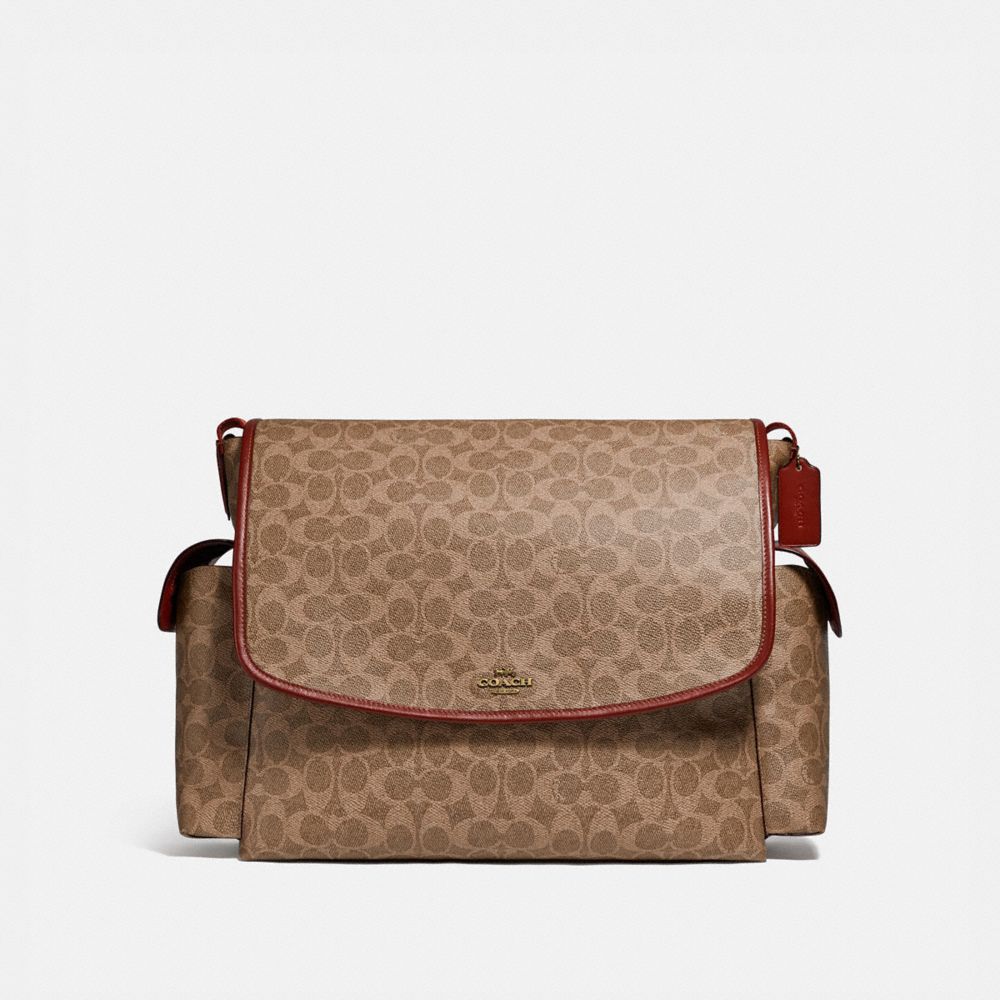 red and tan coach purse