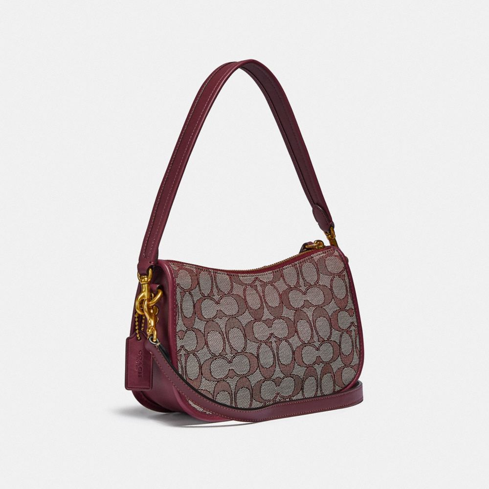 coach swinger bag in signature jacquard brown
