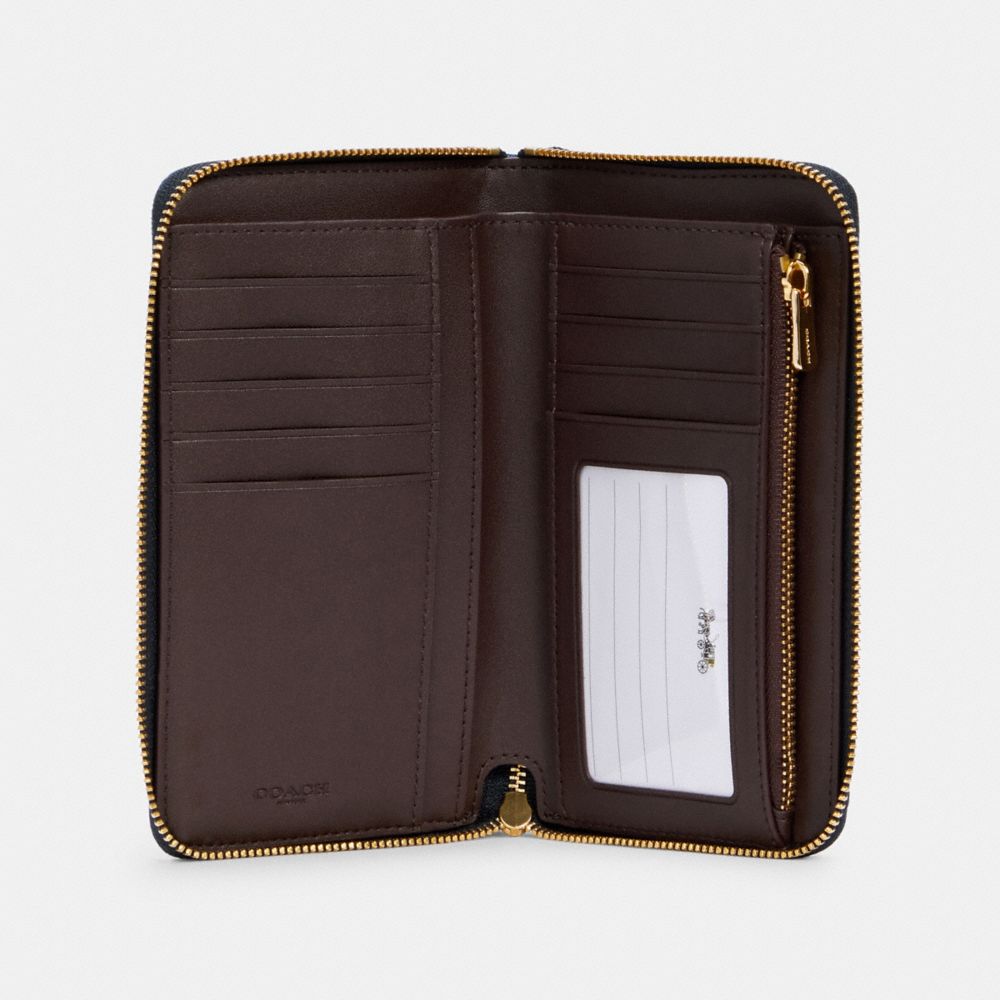 MEDIUM ZIP AROUND WALLET WITH QUILTING - Alternate View 1