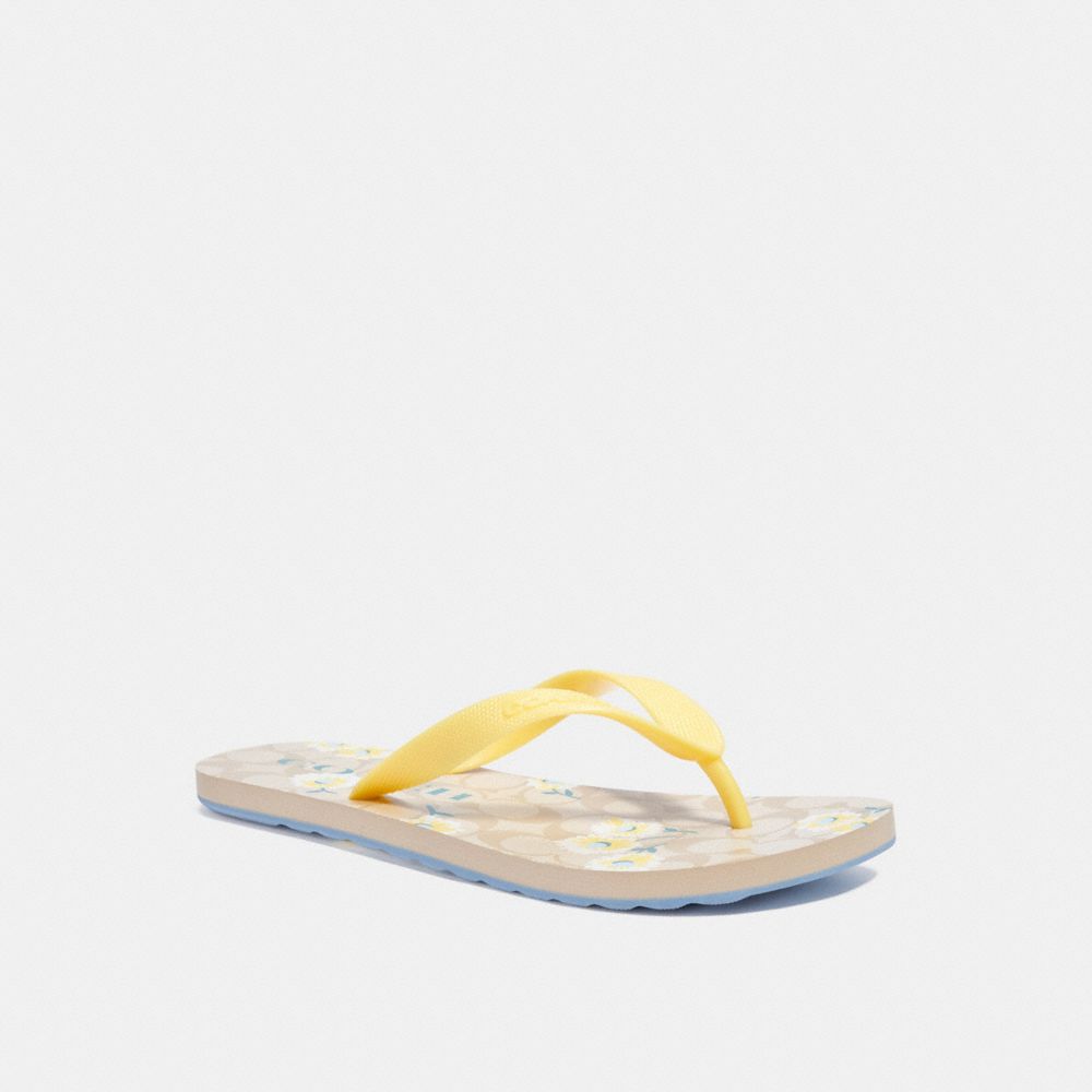 coach signature flip flops