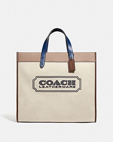 field tote 40 with coach badge in organic cotton canvas