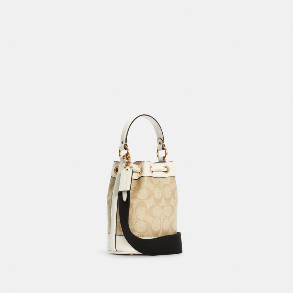 COACH®,Dempsey Drawstring Bucket Bag 15 In Signature Canvas,,Angle View
