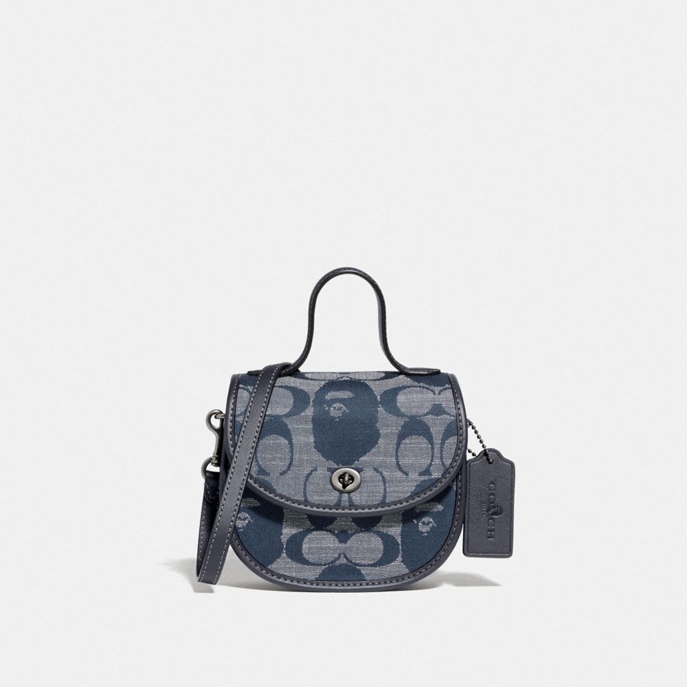 coach mini top handle saddle bag