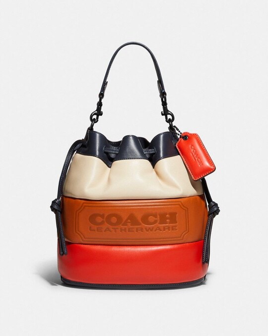 FIELD BUCKET BAG WITH COLORBLOCK QUILTING AND COACH BADGE