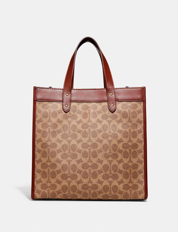 Coach Field Tote in Signature Canvas With Patches B4/Tan Rust Translations 12.1 Retail translations Alternate View 2