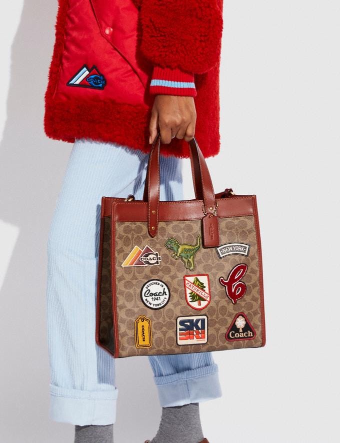 Coach Field Tote in Signature Canvas With Patches B4/Tan Rust Translations 12.1 Retail translations Alternate View 5