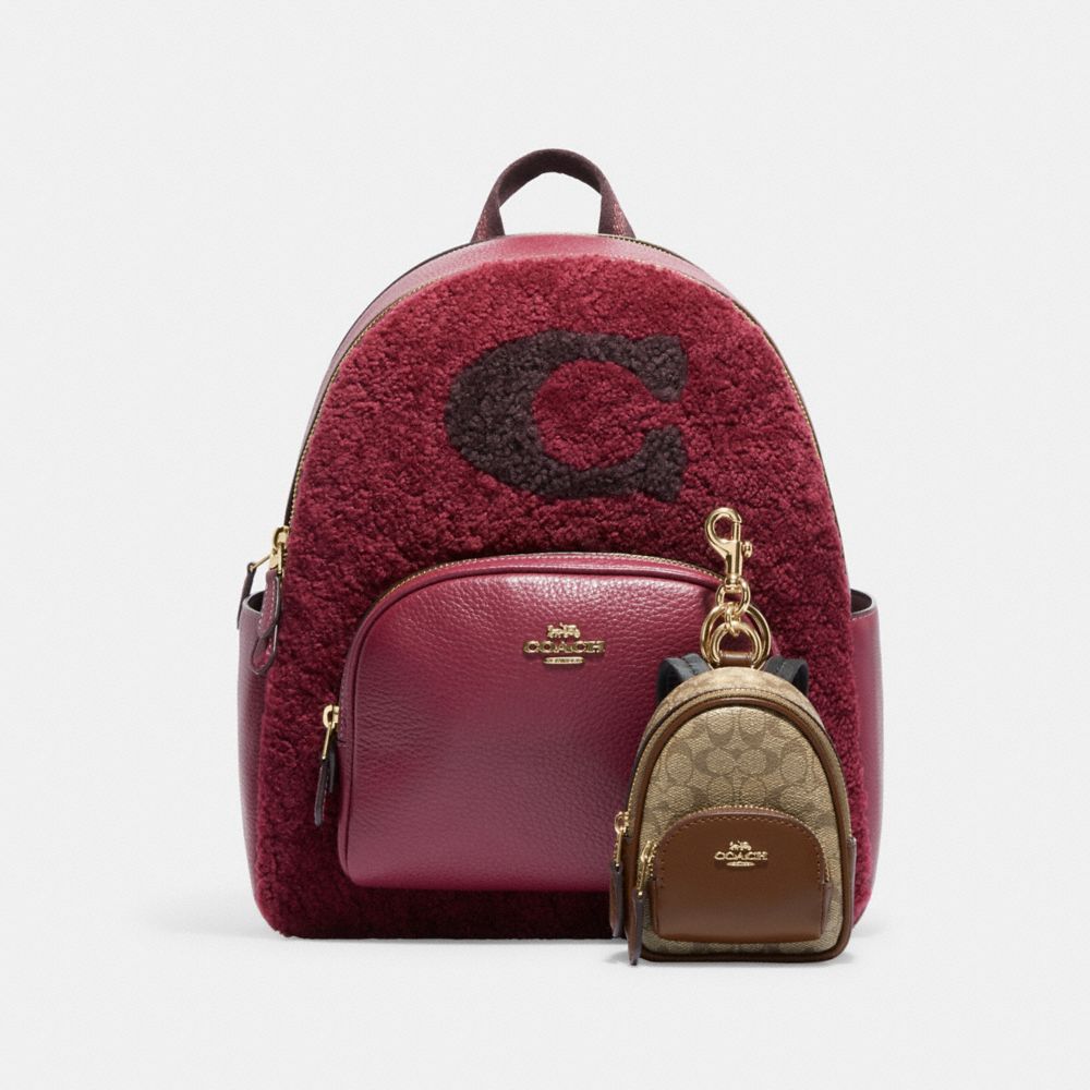 COACH®,QA_AUTO_MINI COURT BACKPACK SIGNATURE BAG CHARM,,Angle View