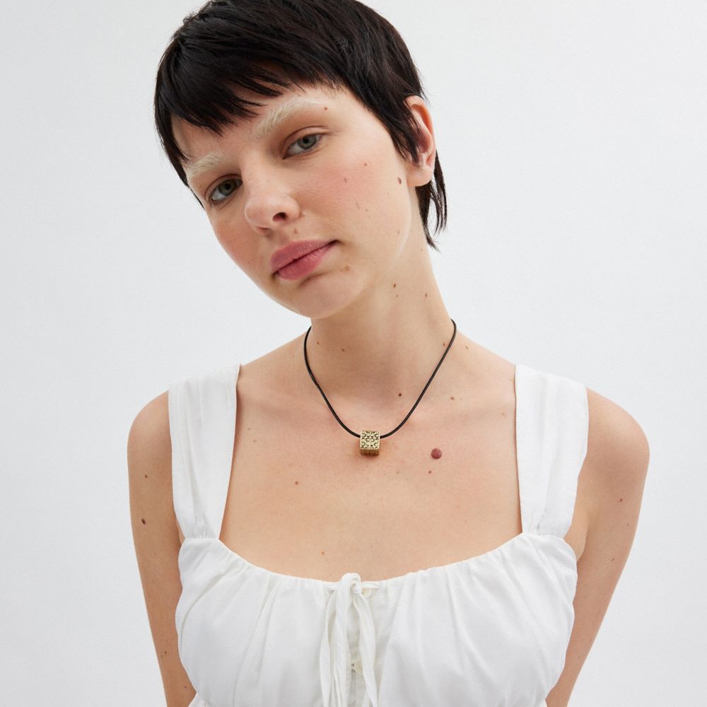 COACH®,Quilted Cube Leather Pendant Necklace,Leather,Single Strand,Cubic Zirconia,Logo,Casual,Black,Detail View