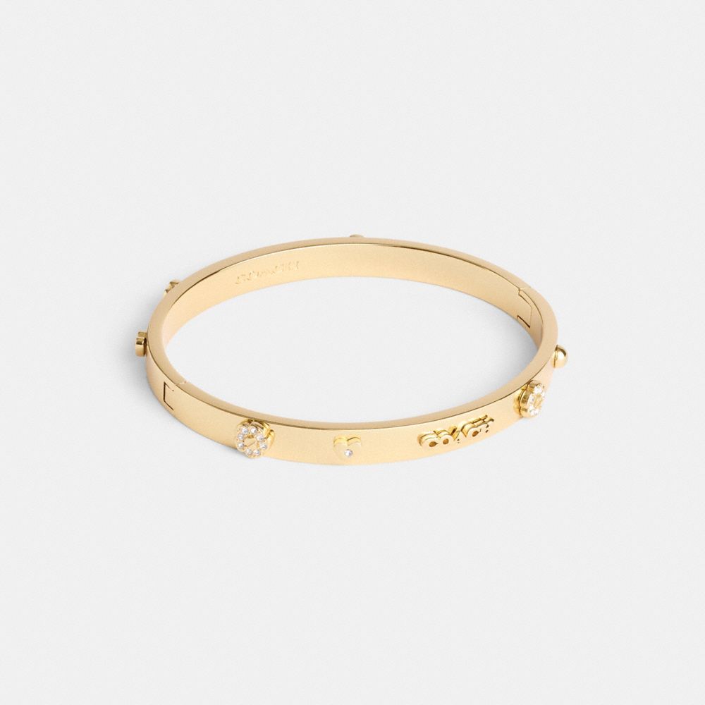 COACH®,Pegged Hinged Bangle,Cubic Zirconia,Crystal,Floral Embellishment,Gem Embellishment,Logo,Heart Embellishment,Day Party,Clear,Front View