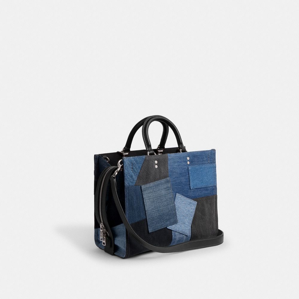 COACH®,Rogue Bag With Repurposed Denim Patchwork,Leather,Denim,Tote,Studded,Logo,Metal,Patchwork,Color Block,Adjustable,Si...,Blue,Angle View