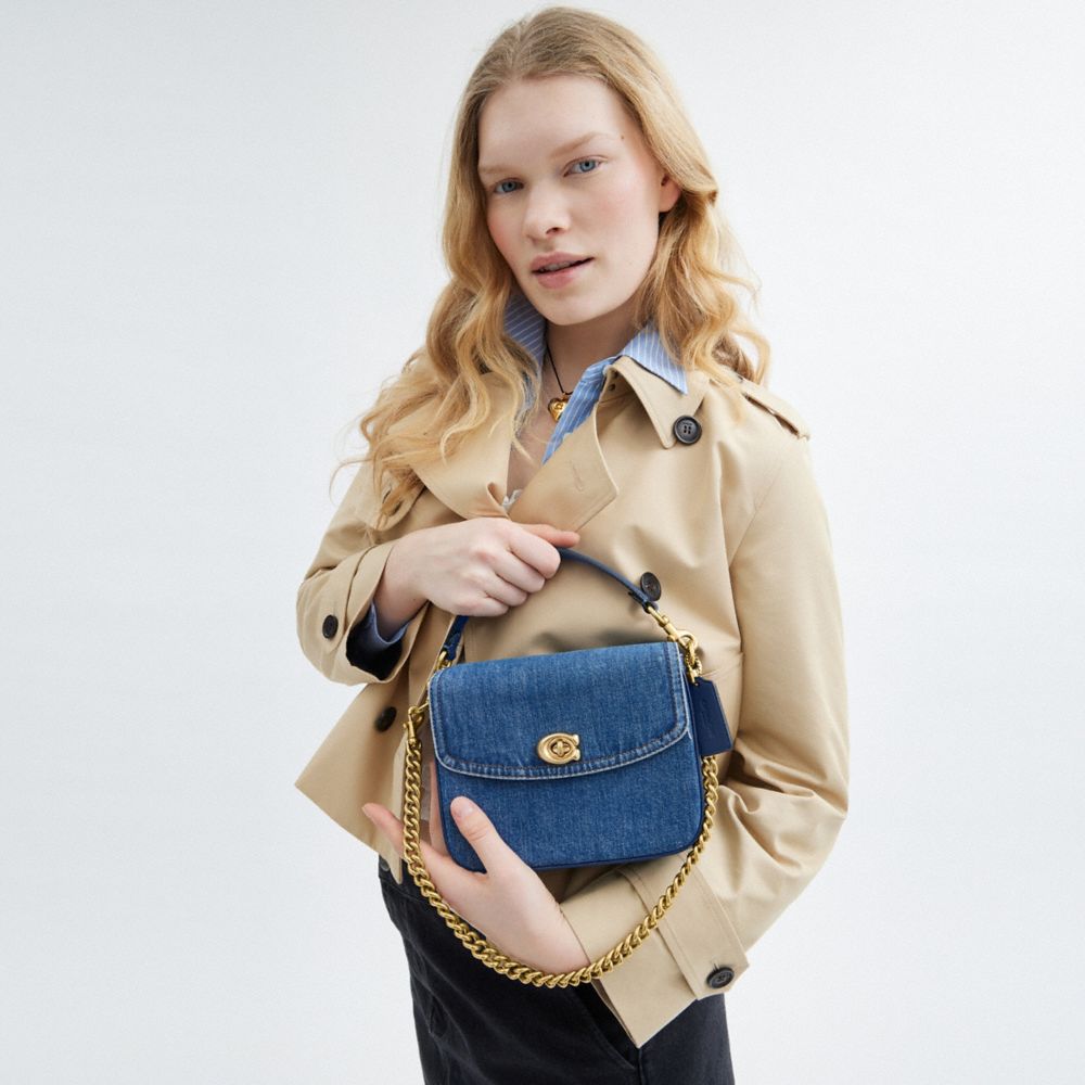 COACH®,Cassie Crossbody Bag 19,Denim,Calfskin Leather,Crossbody,Embossed,Logo,Metal,Sustainable,Brass,Day Party,Blue,Detail View