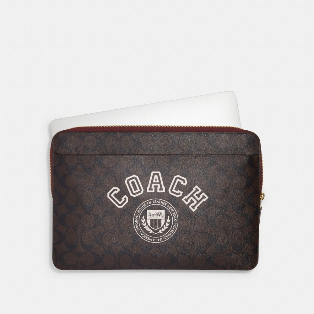 COACH Laptop Sleeve In Signature Canvas With Varsity
