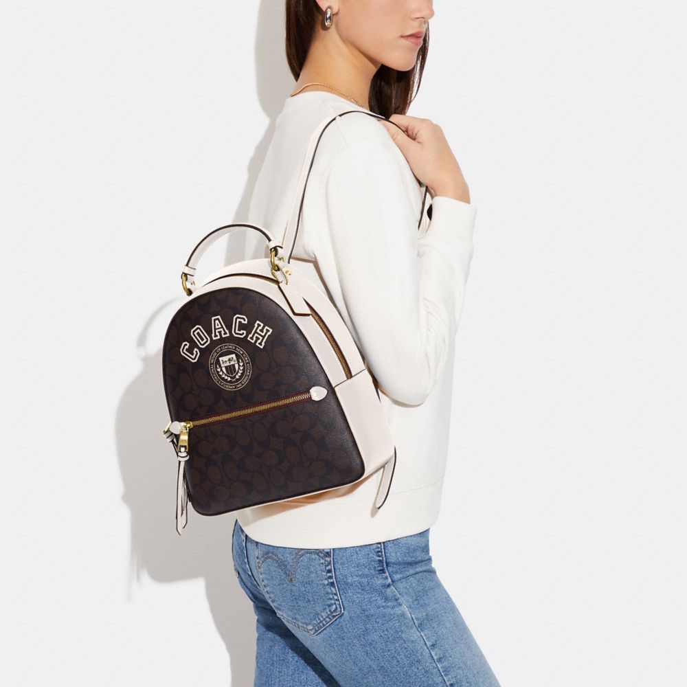 JORDYN BACKPACK IN SIGNATURE CANVAS WITH VARSITY MOTIF