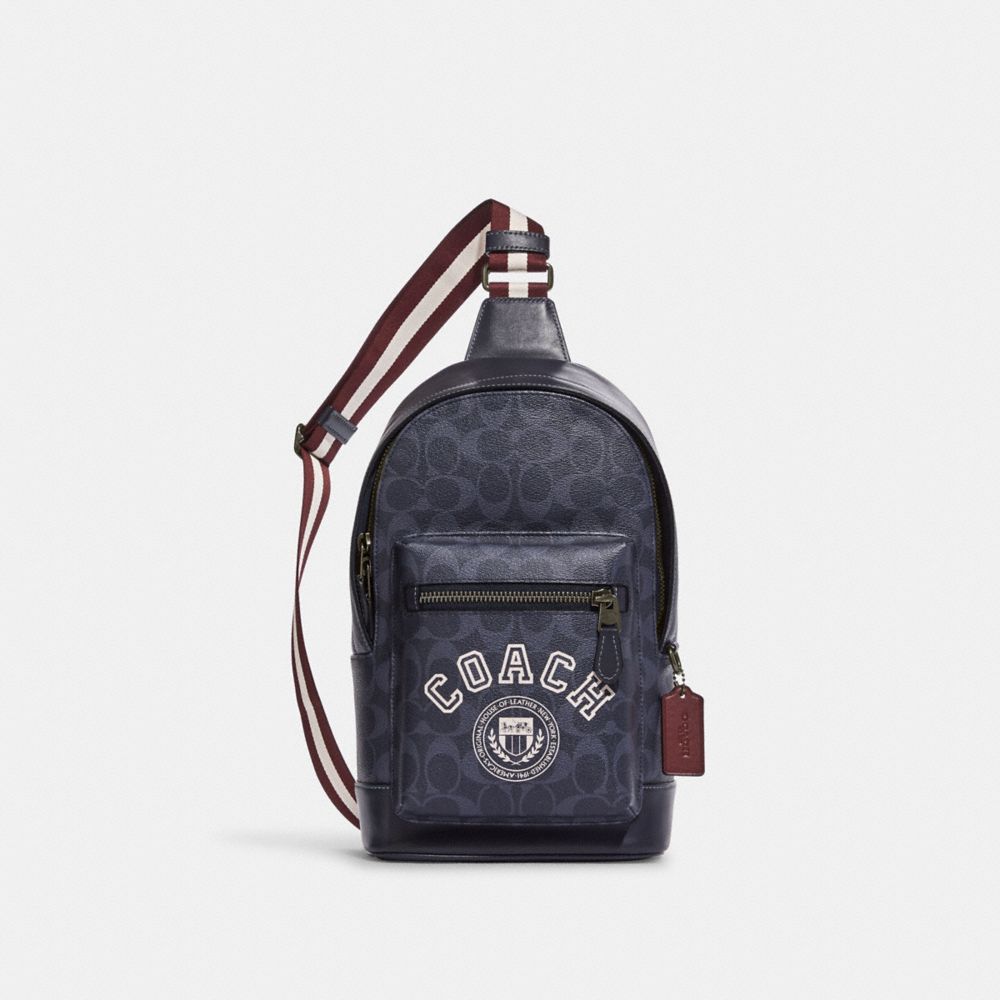 Coach West Backpack In Signature Canvas With Varsity Motif