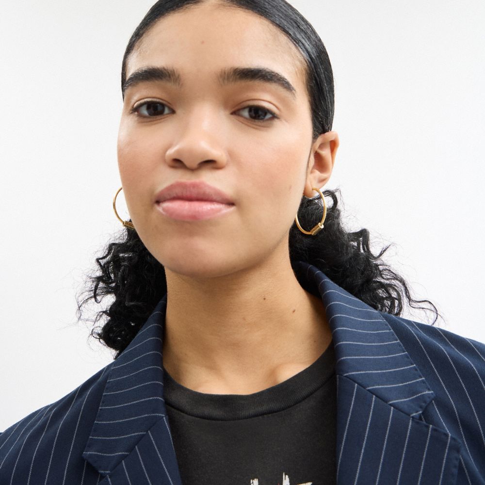 COACH®,Quilted Signature Bead Large Hoop Earrings,Hoops,Cubic Zirconia,Logo,Bead Embellishment,Day Party,Black,Detail View