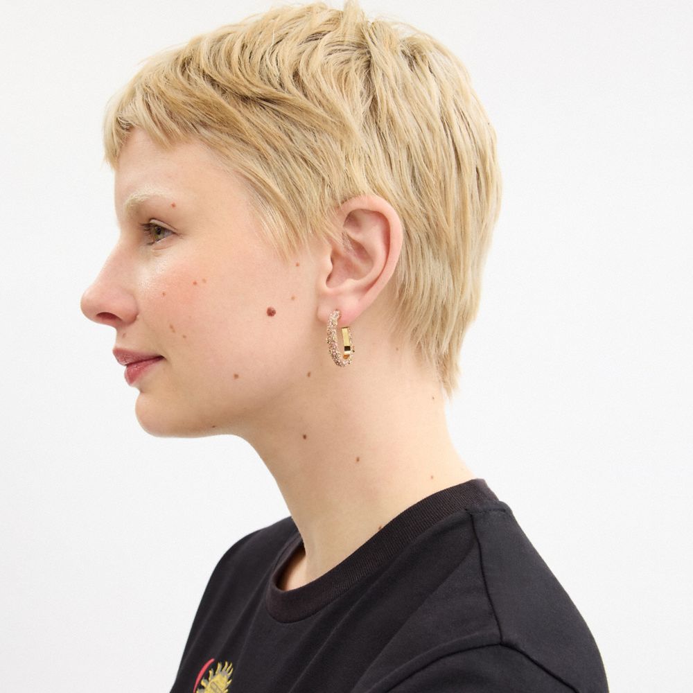 COACH®,Pavé Floral Oval Hoop Earrings,Hoops,Crystal,Cubic Zirconia,Glass,Logo,Gem Embellishment,Lettering Word,Day Party,Pink,Detail View