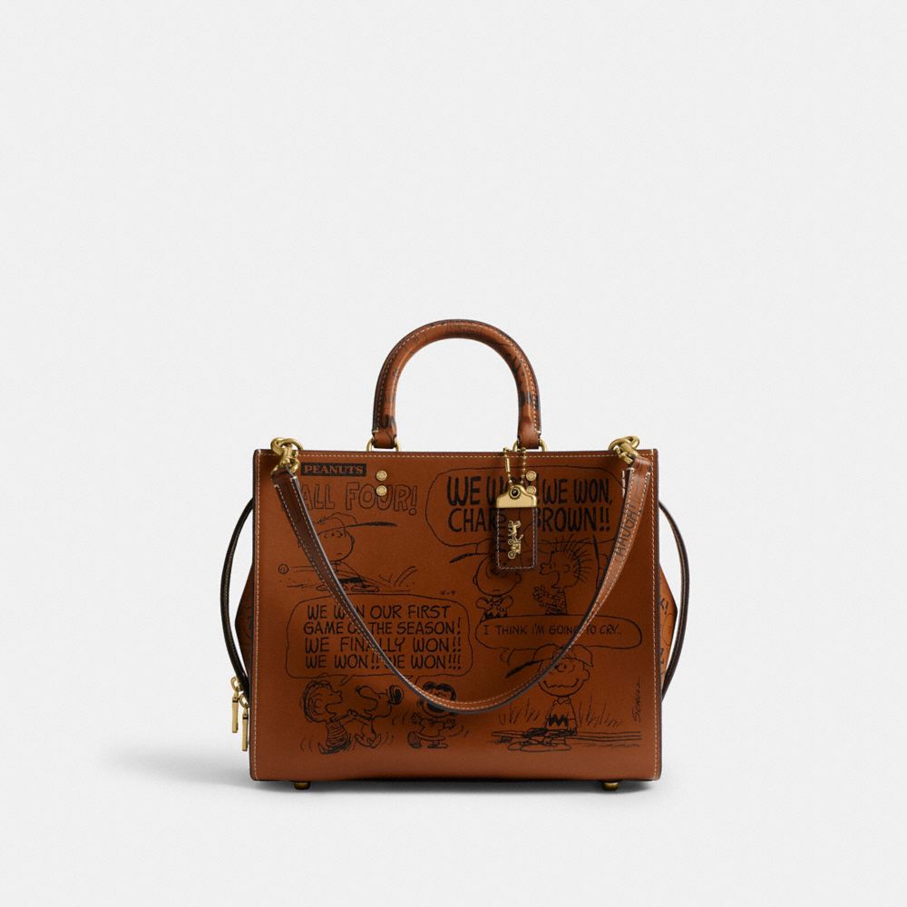 COACH®,Coach X Peanuts Rogue Bag With Newspaper Print,,Front View