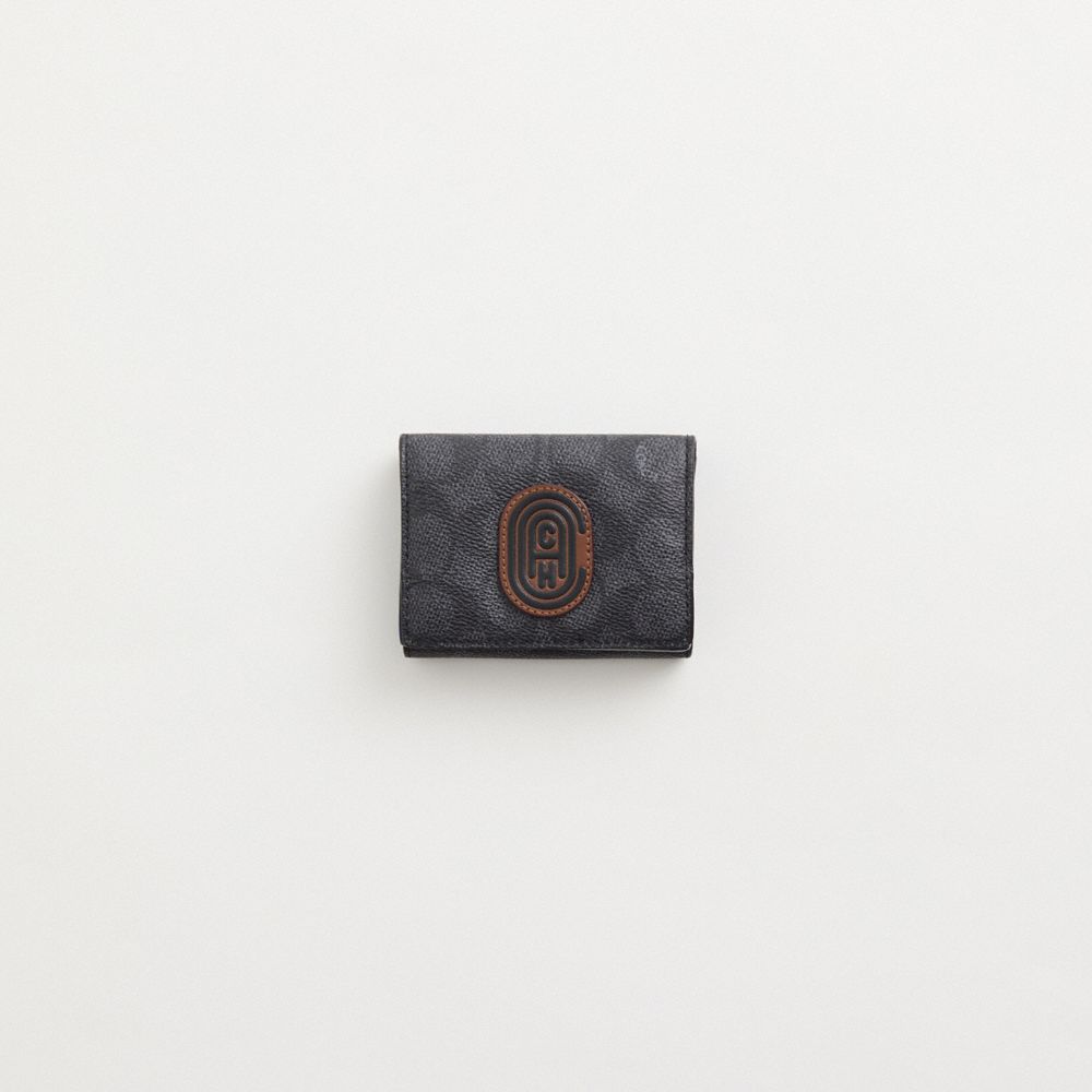 COACH®,Restored Origami Coin Wallet In Signature Canvas With Coach Patch,,Front View