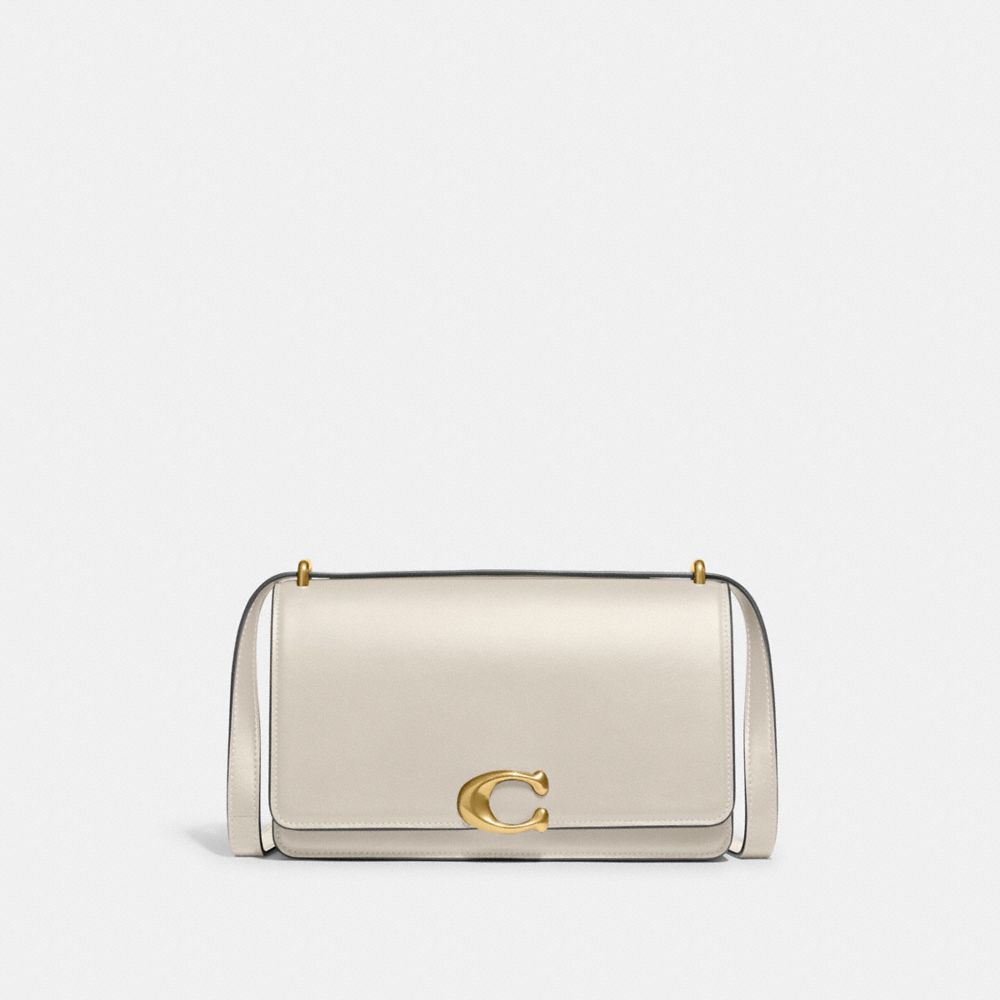 Shop Coach Schultertasche Mit Bandit-motiv In Brass/ivory