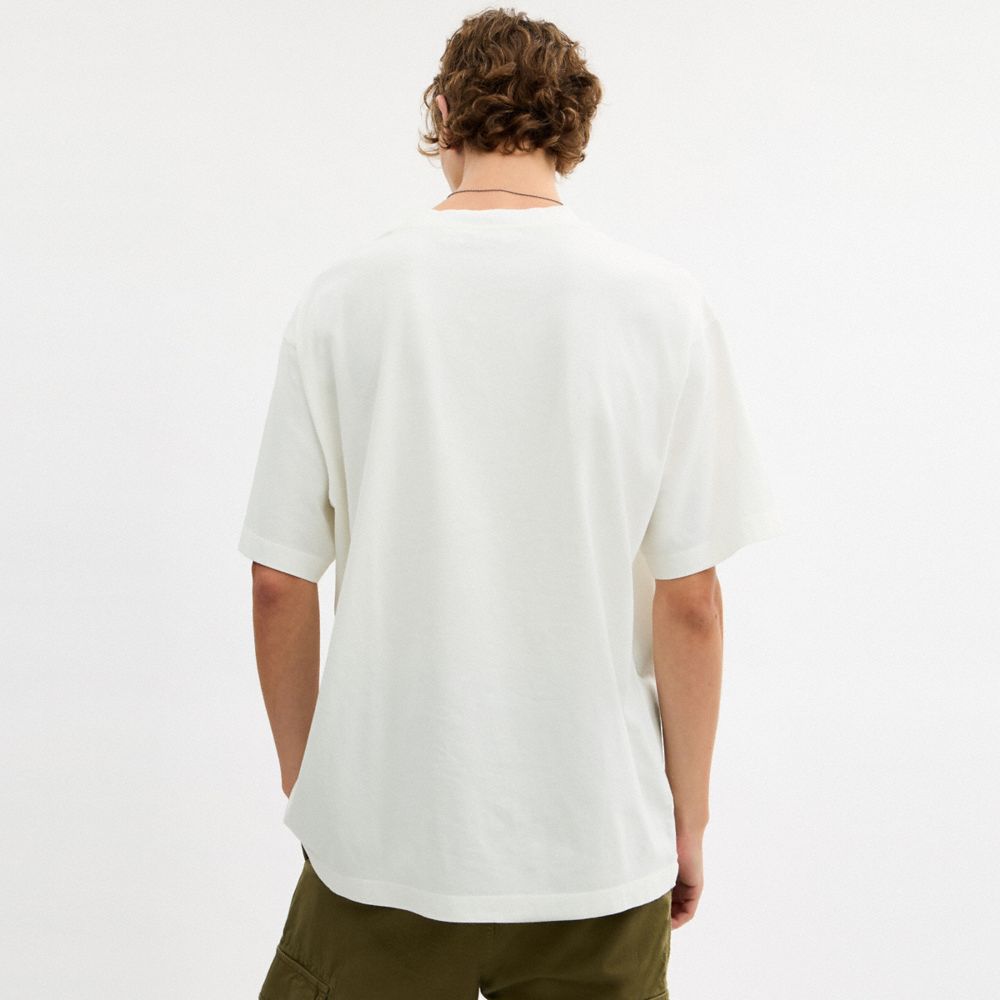 COACH®,Collage Train Relaxed T-Shirt In Organic Cotton,Cotton Knit,Organic Cotton,Cotton,Knit,T Shirt,Logo,Eco-Friendly,Ca...,White,Scale View