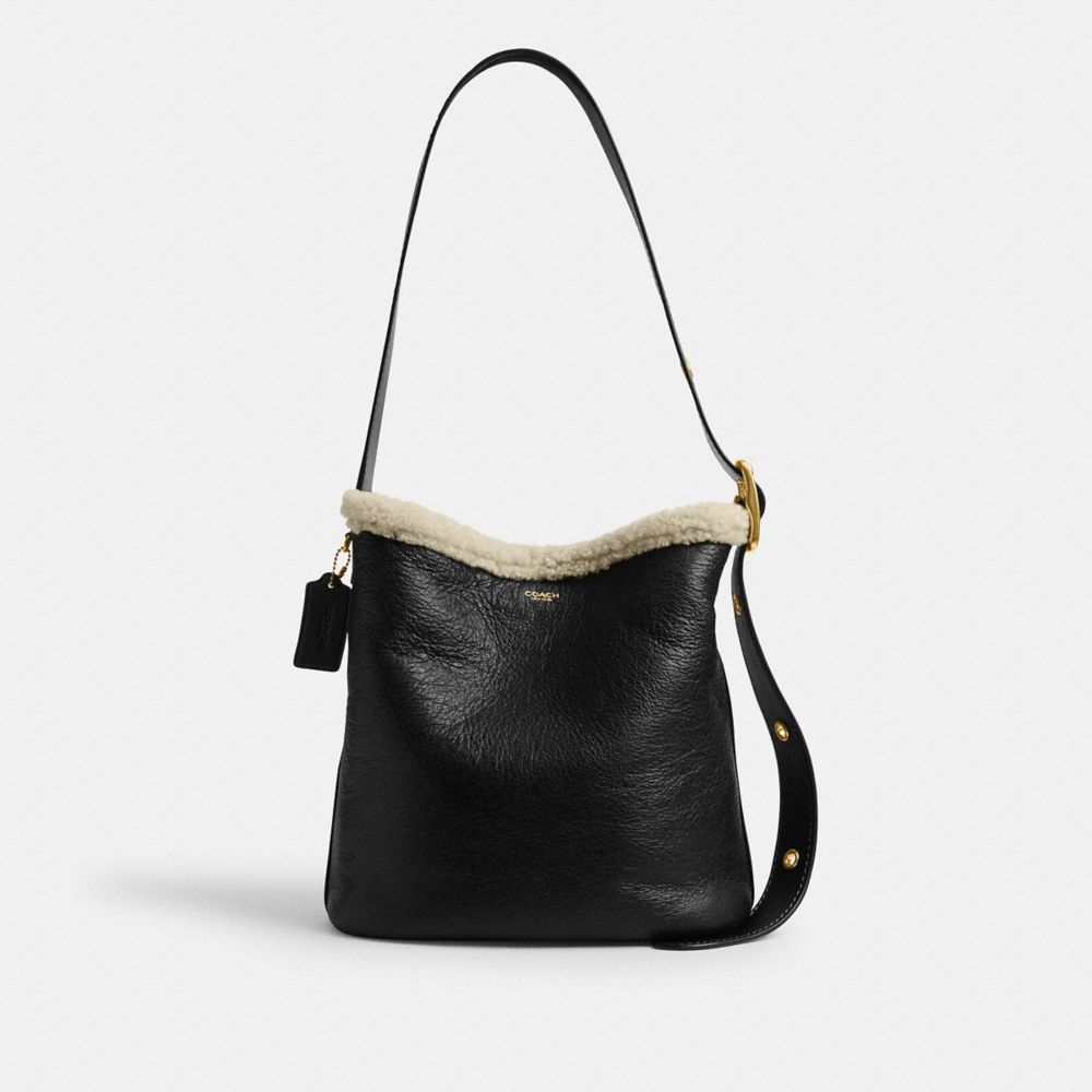 COACH®,Bleecker Bucket Bag In Shearling,Leather,Sheepskin,Shearling,Bucket,Color Block,Shearling,Removable Pouch,Adjustabl...,Black,Front View