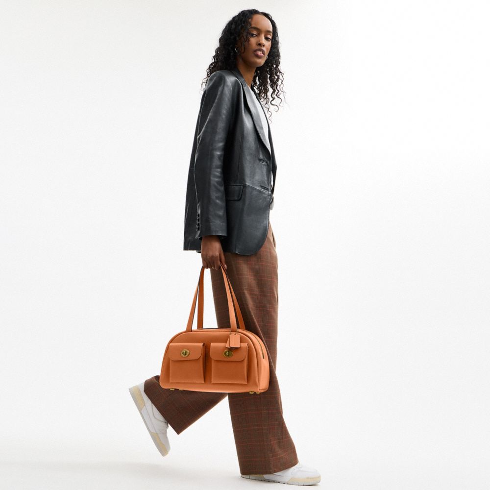 COACH®,Twin Turnlock Bag,Leather,Barrel Bag,Lined,Luggage Tag,Brass,Day Party,Brown,Detail View