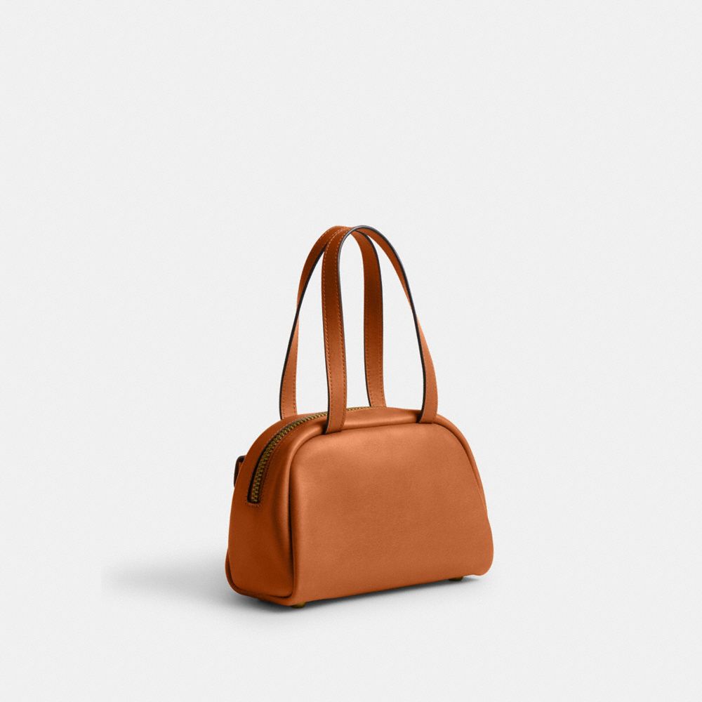 COACH®,Twin Turnlock Bag 20,Leather,Bowler Bag,Compact,Luggage Tag,Lined,Brass,Day Party,Brown,Angle View