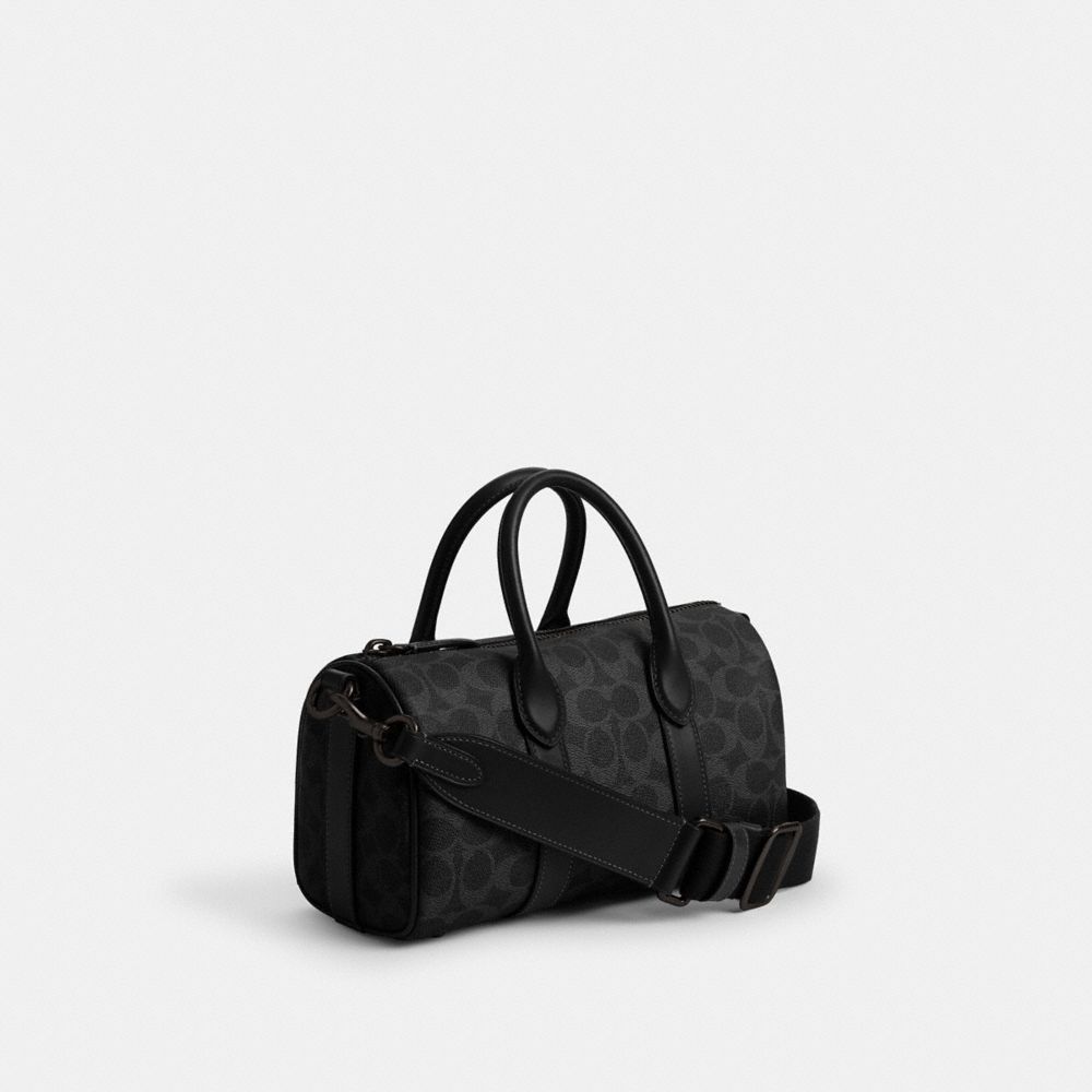 COACH®,Compass Bag 25 In Signature Canvas,Canvas,Leather,Weekender,Gold Metal,Black,Angle View