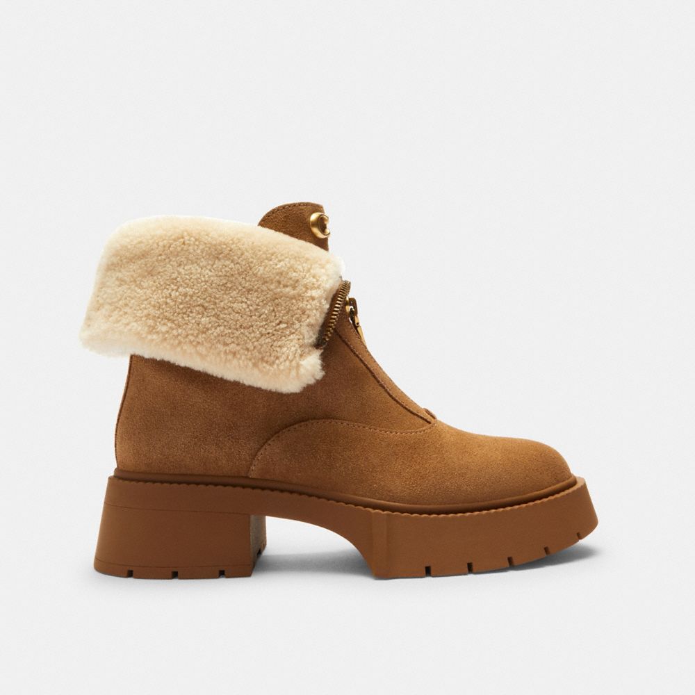 COACH®,Leah Platform Zip Bootie,Rubber,Suede,Shearling,Winter,Color Block,Fold Over Fabric,Logo,Metal,Shearling,Pull Tab,A...,Brown,Angle View