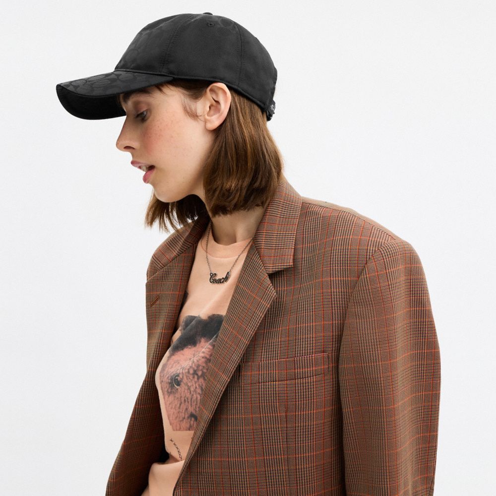 COACH®,Tonal Signature Baseball Hat,Nylon,Cotton,Baseball Cap,Metal,Graphic,Pattern,Grommet,Logo,Embossed,Cooling,Breathab...,Black,Detail View