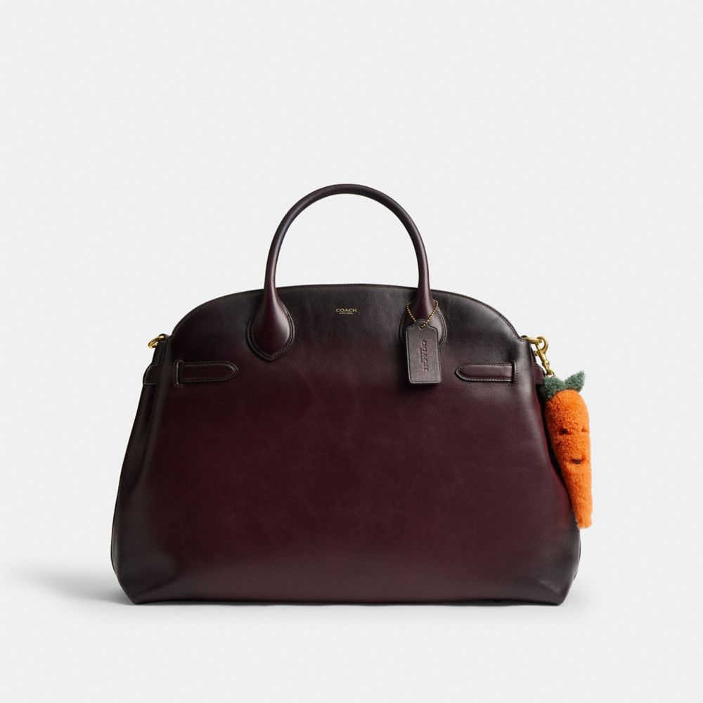 COACH®,Carroty Bag Charm In Shearling,Shearling,Soft Wool,Bag Charm,Pendant,Shearling,Embellished,Key Ring,Compact,Padded,...,Orange,Angle View