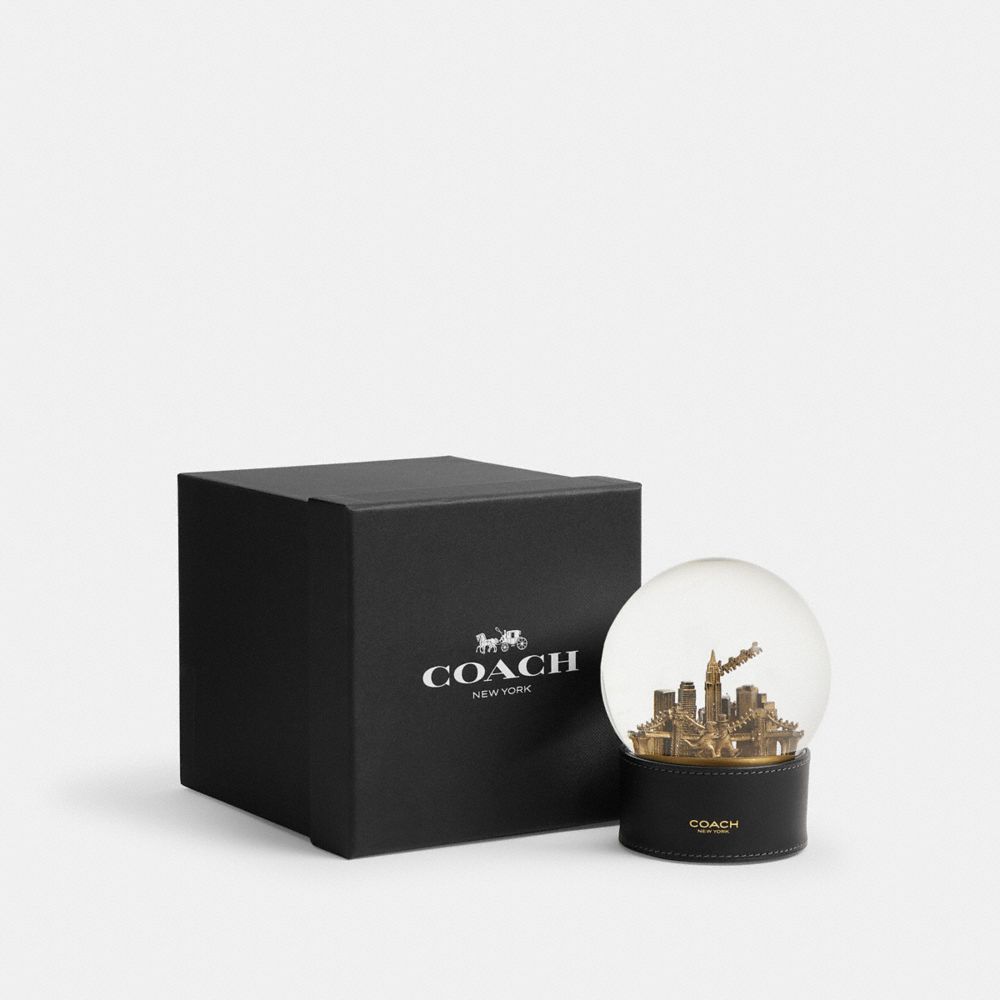 COACH®,Snow Globe With Rexy And Snowman,Figurine,Globe,Snowglobe,Metal Material,Glass,Gold Metal,Black,Front View