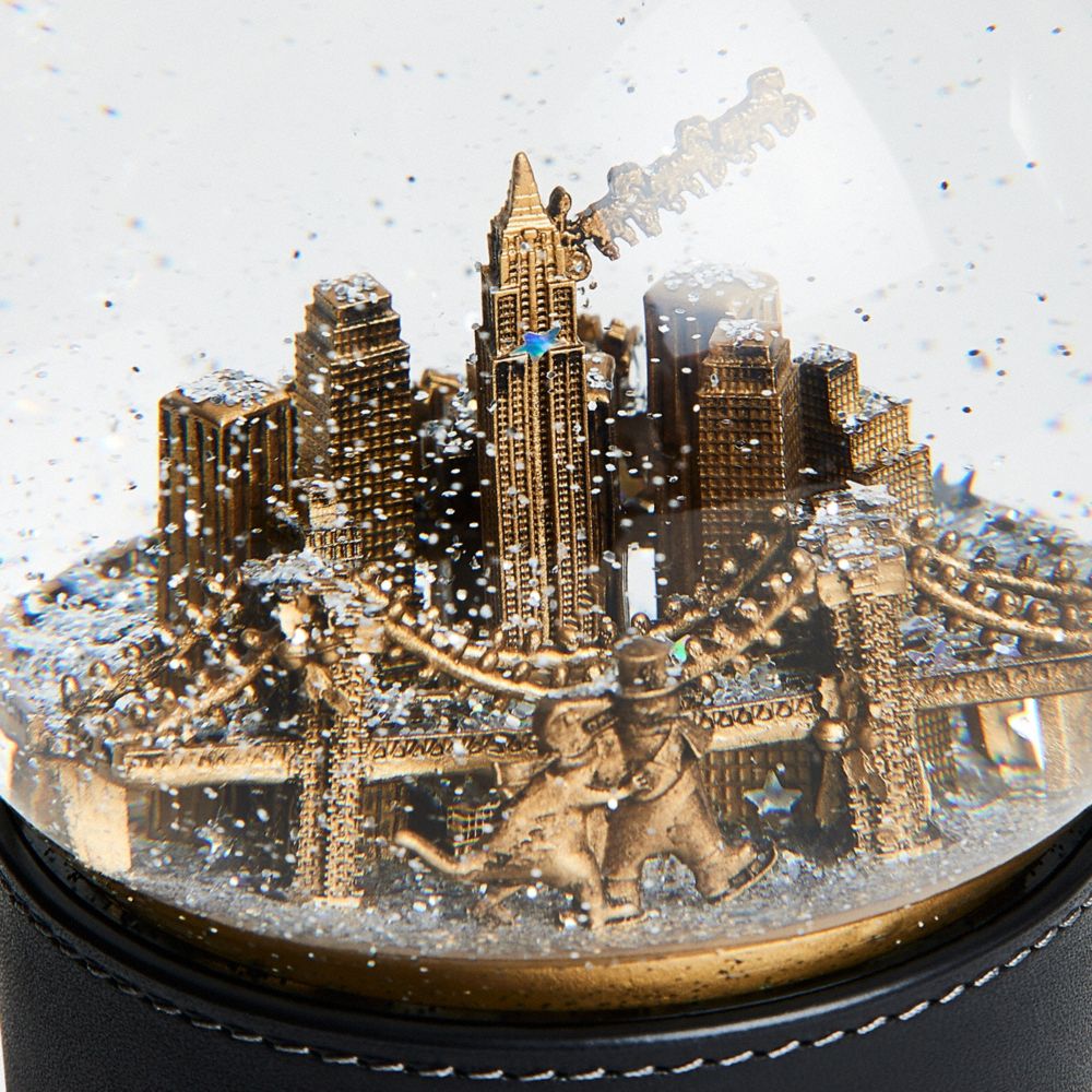 COACH®,Snow Globe With Rexy And Snowman,Figurine,Globe,Snowglobe,Metal Material,Glass,Gold Metal,Black,Closer View