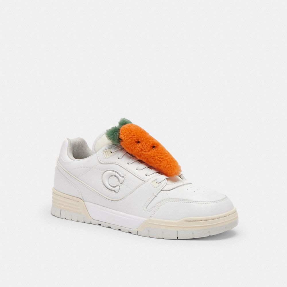 COACH®,Carroty Shoe Charm In Shearling,Orange,Angle View