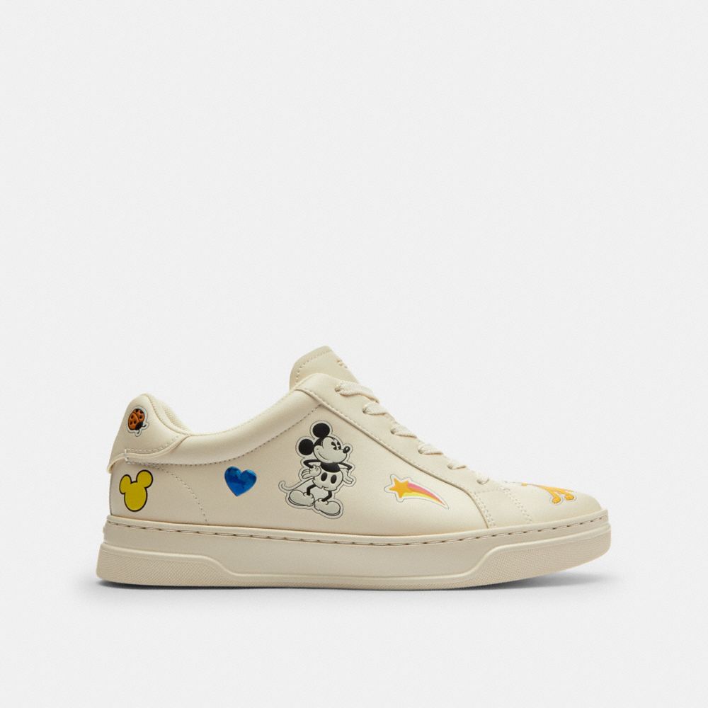 COACH®,Disney X Coach High Line Sneaker With Sticker Print,Leather,EVA,Low Top,Casual,Fabric,Flexible Insole,Flexible,Cush...,Cream,Angle View