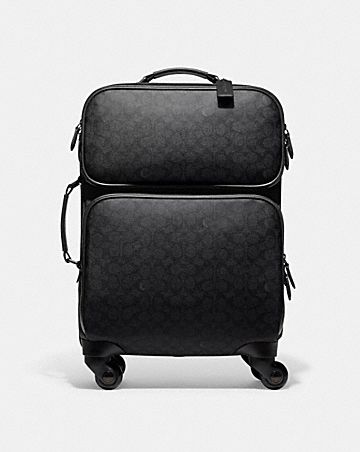 wheeled carry on in signature canvas