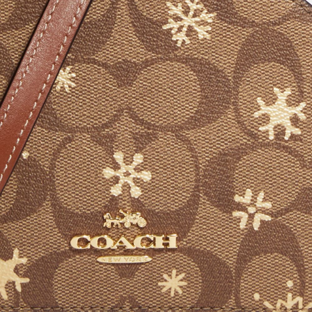 mini serena crossbody in signature canvas with snowflake print